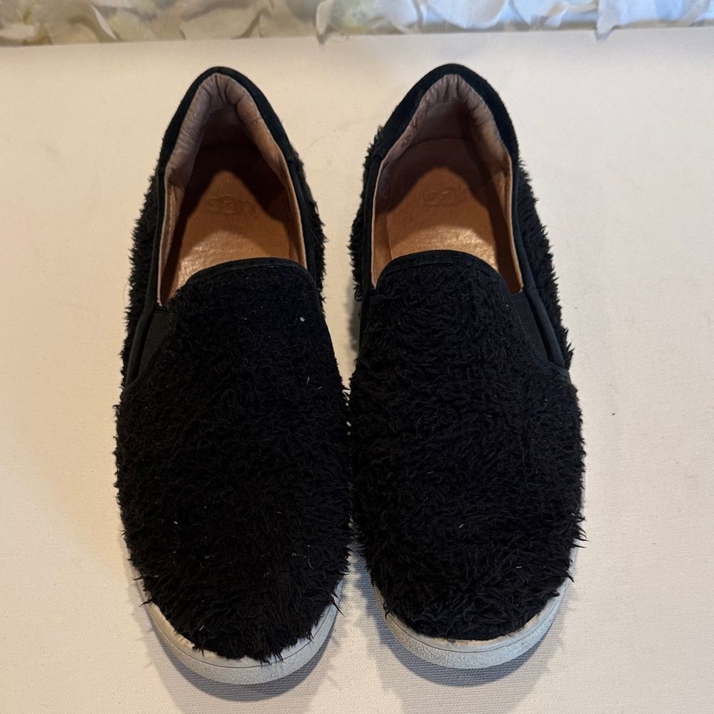 UGG Black Fuzzy Slip-On Sneakers with White Soles